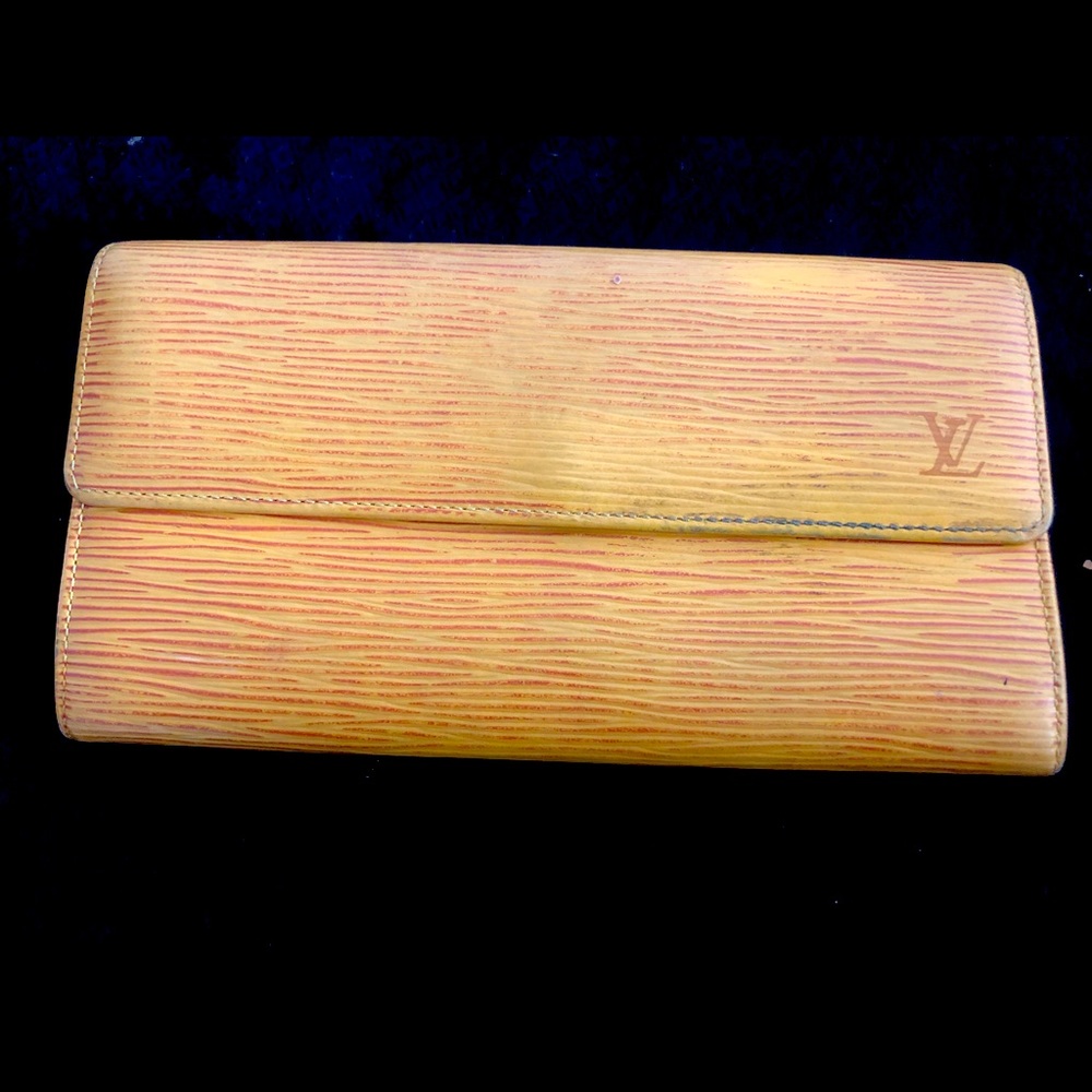 Vintage Louis Vuitton yellow Epi wallet with purple interior